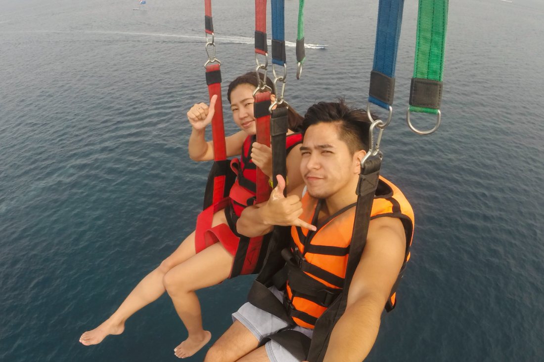 Justin and Nina parasailing over Boracay