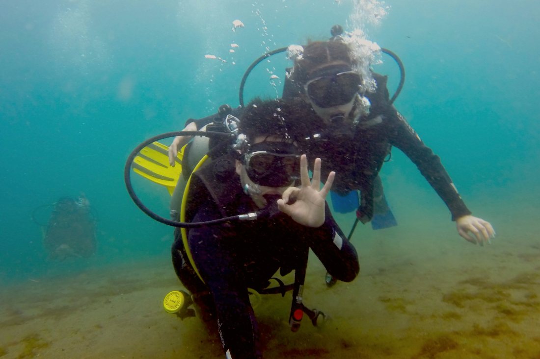 Justin and Nina scuba diving